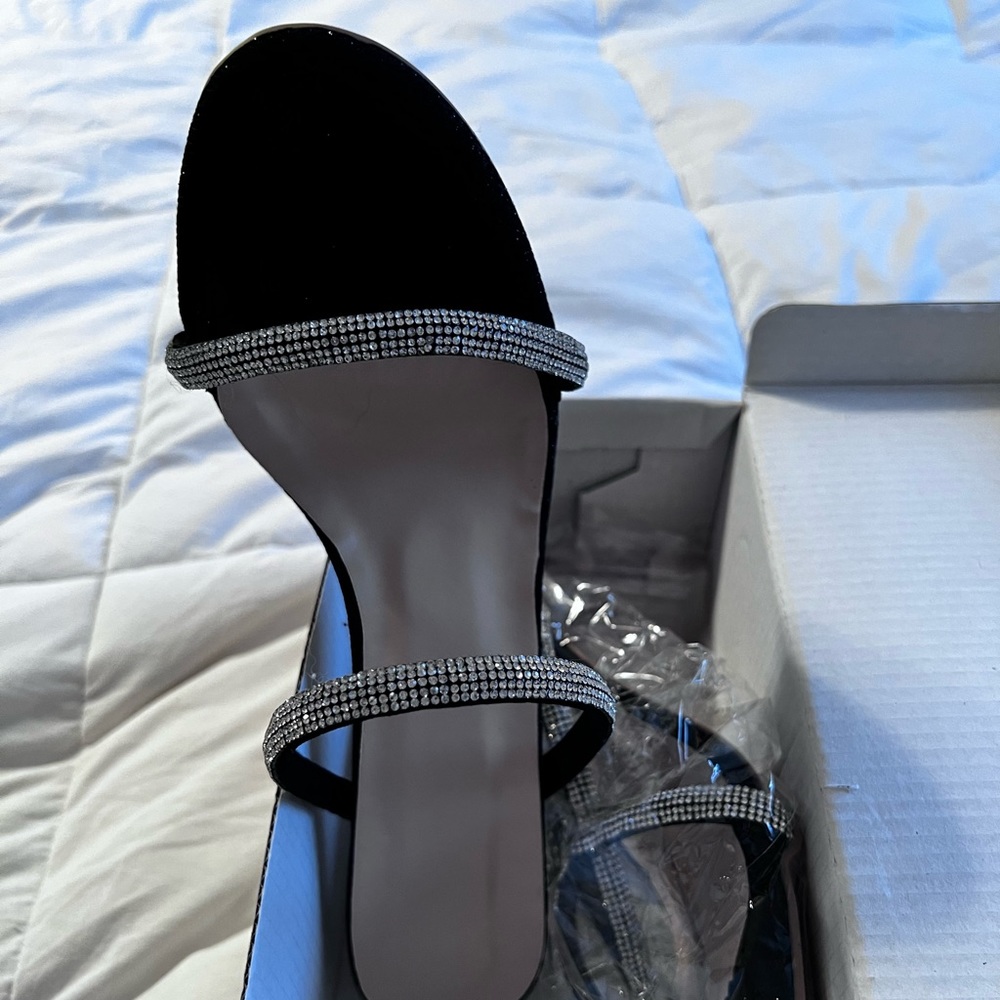 Black and glitter heels